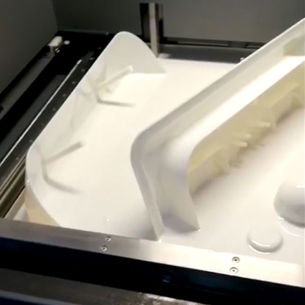 SLA-3D-Printing-Process-And-Display-Of-Plastic-Prototypes.jpg